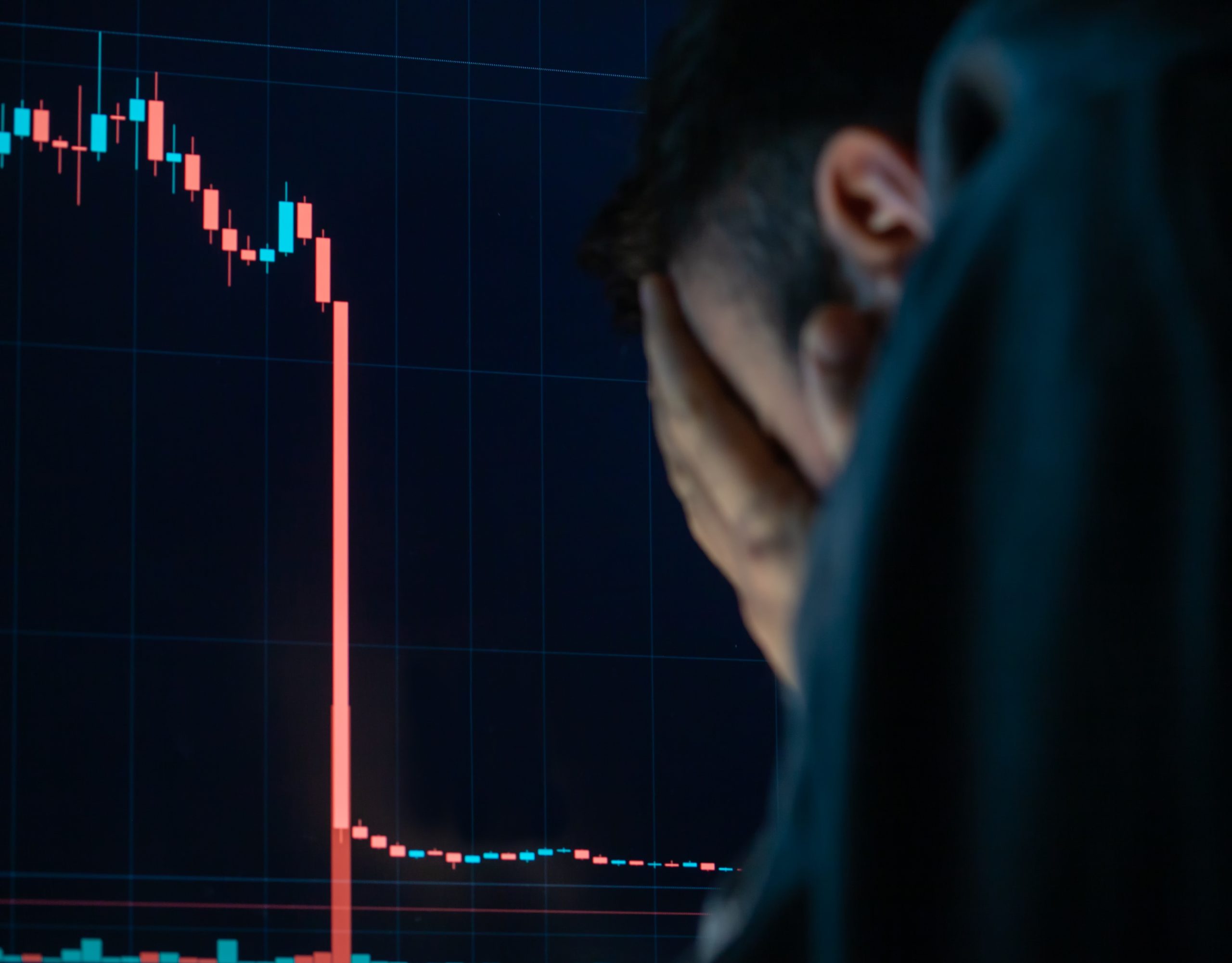 Market Uncertainty - Frustrated depressed man